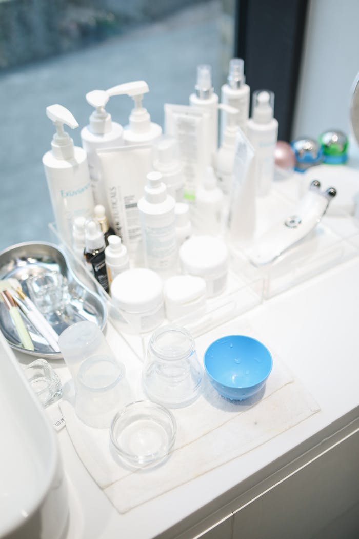 why-choose-us A clean and organized display of skin care products and beauty tools in a salon setting.